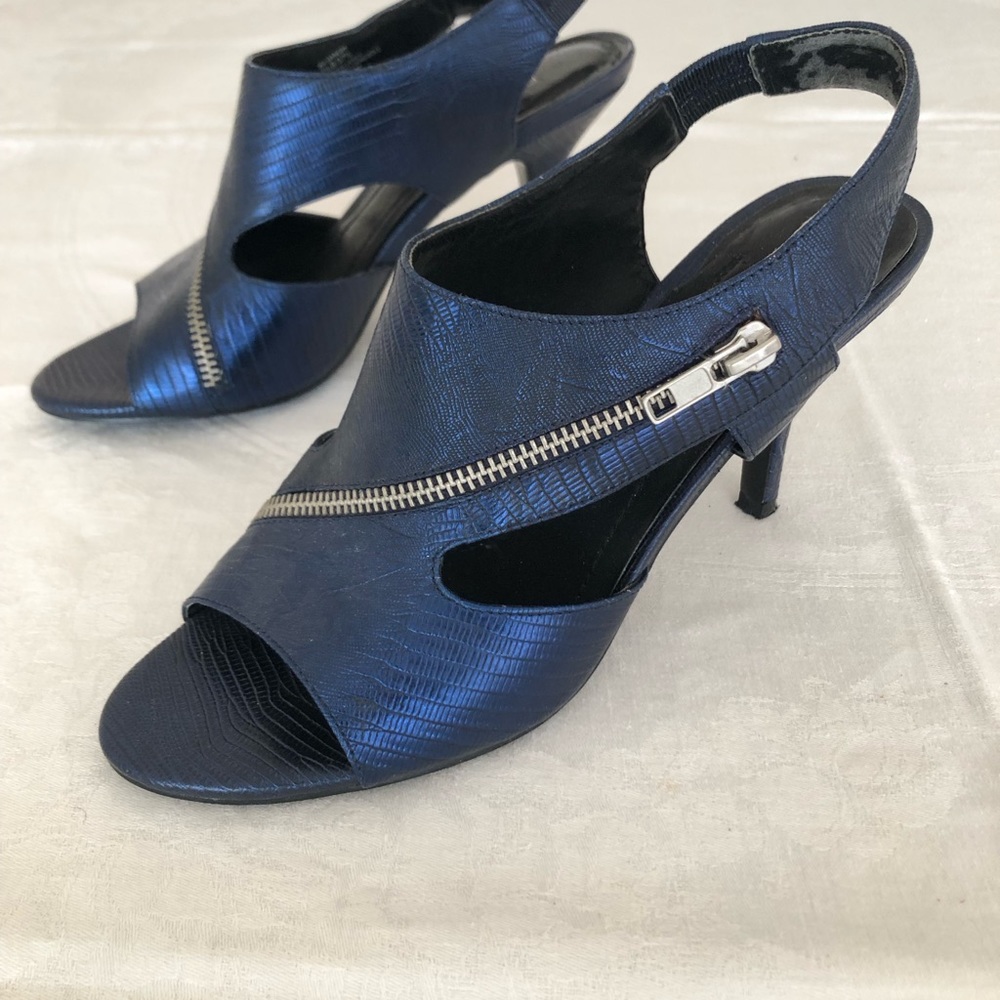 Size 7, dark blue sling back dress shoe by BCBG